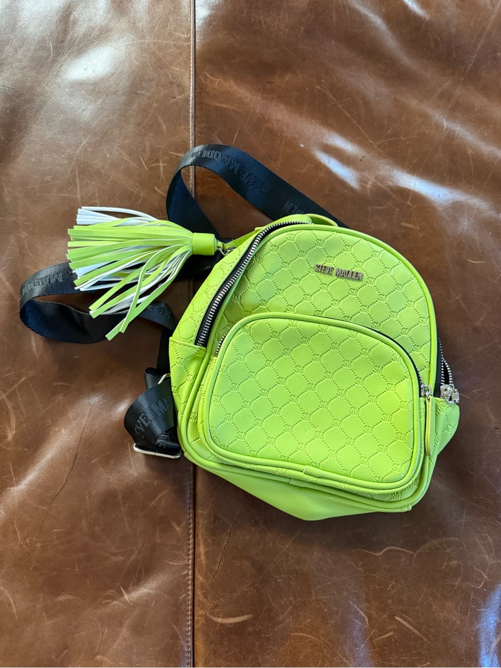Steve Madden lime green logo motif mini backpack with tassel keychain. NWOT.